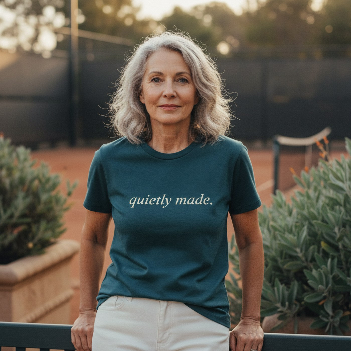 The dinkmade Foundation tee worn at the court — small chest mark, relaxed fit, built to last