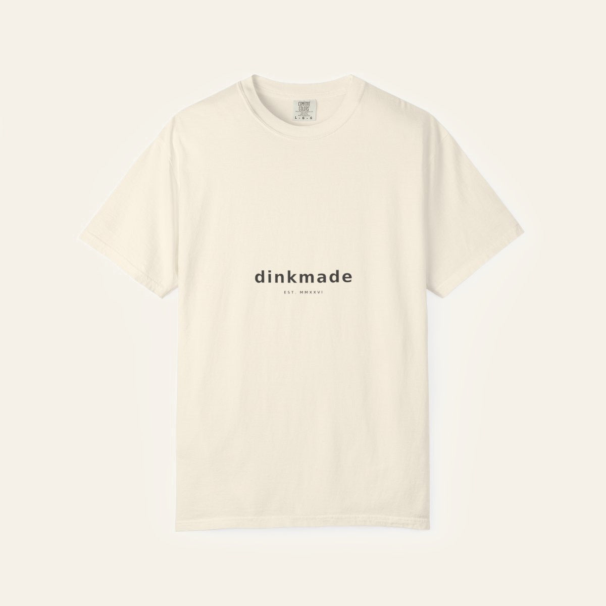 The Stamp Tee — Charcoal on Cream — product flat lay