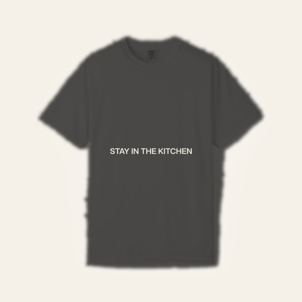 STAY IN THE KITCHEN — Cream on Pepper Pickleball Tee — product flat lay